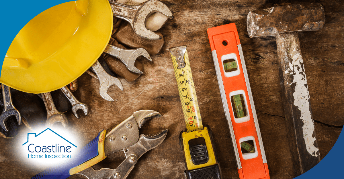 Tools and safety gear including a yellow hard hat, wrenches, a tape measure, a level, and a hammer, with Coastline Home Inspection logo in the corner, emphasizing home inspection services in Florida.